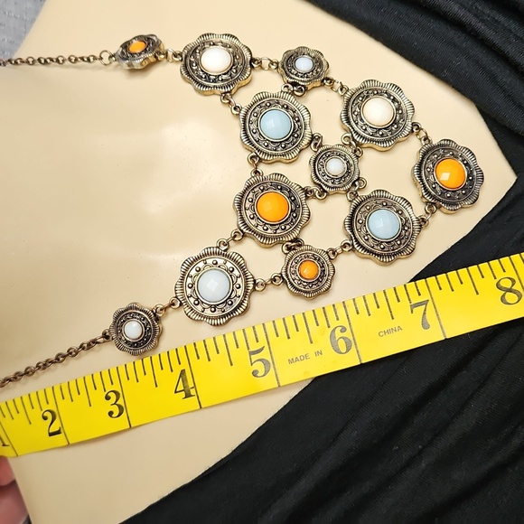 STATEMENT BIB STYLE NECKLACE WITH ORANGE,BLUE,AND WHITE STONES - Picture 8 of 8